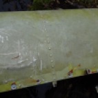 Close-up of the right side of the rudder- of note is the color of primer used, probably green zinc chromate.